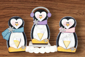 Penguin votive holders.