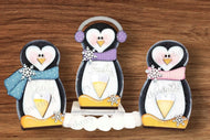 Penguin votive holders.